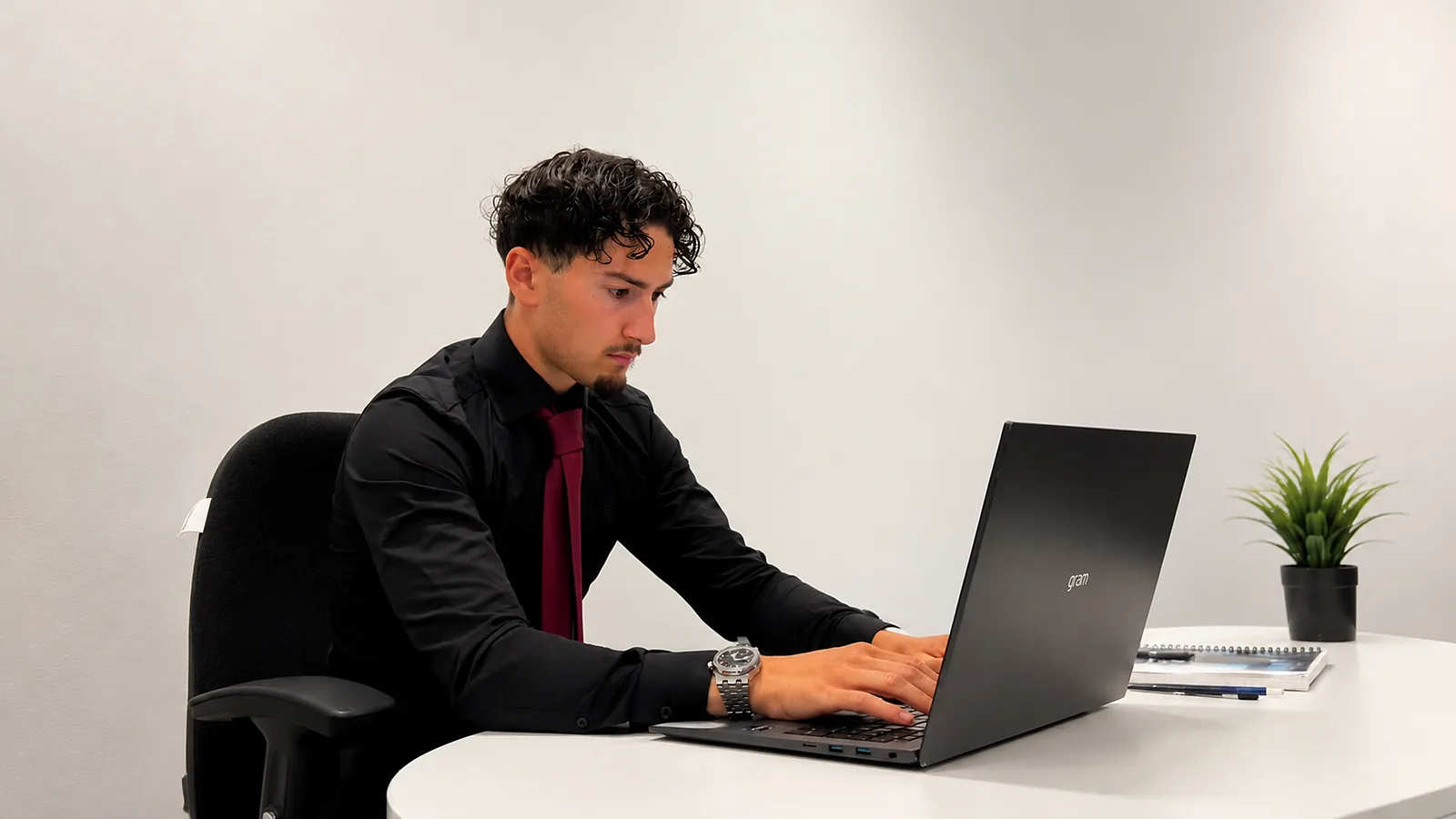 At the desk, building — the quiet half of the job.